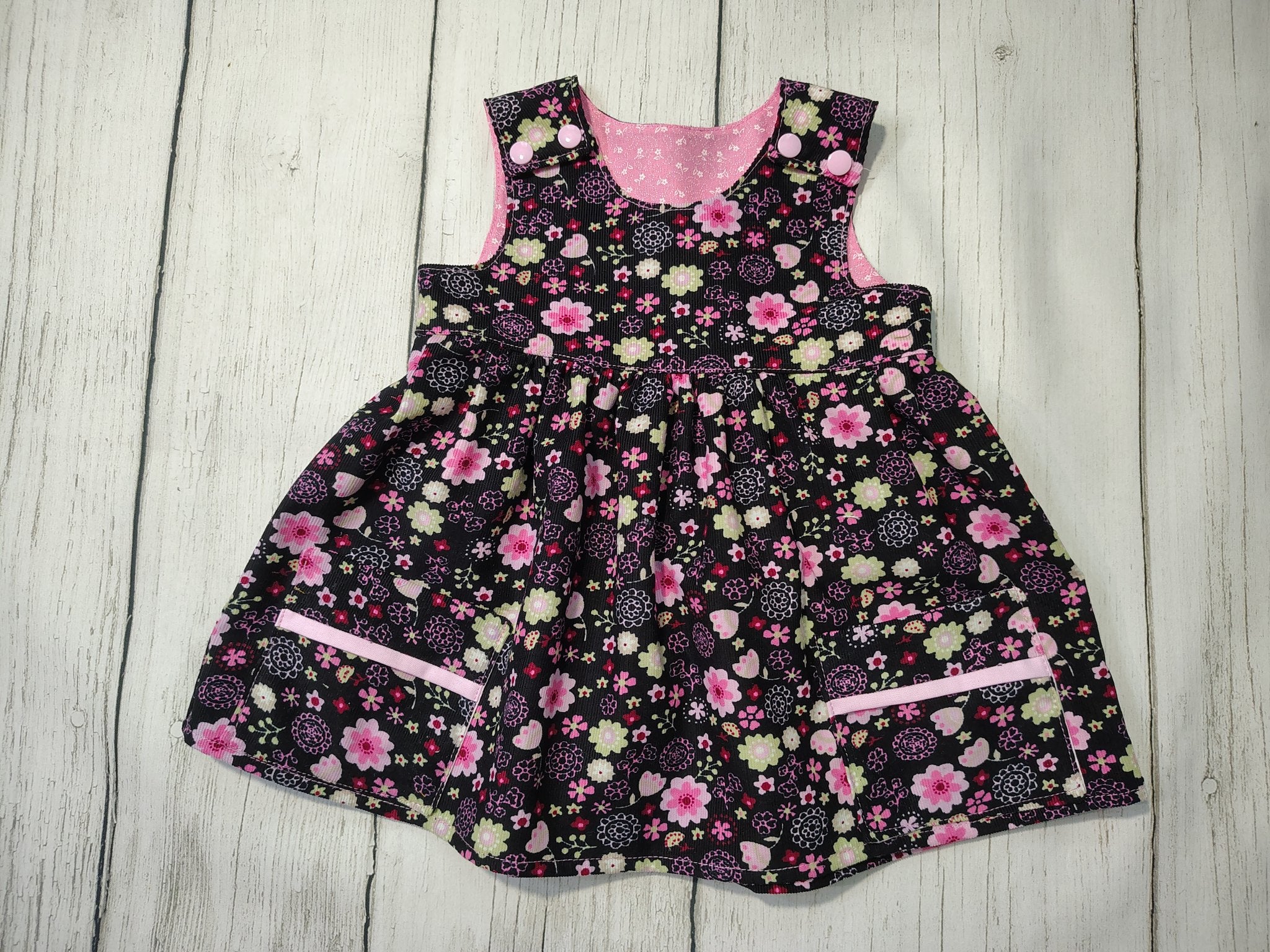 5fef922b396f5759083117ff_-62-pink-floral-o-n-black-cord-09_1760309273722.jpg