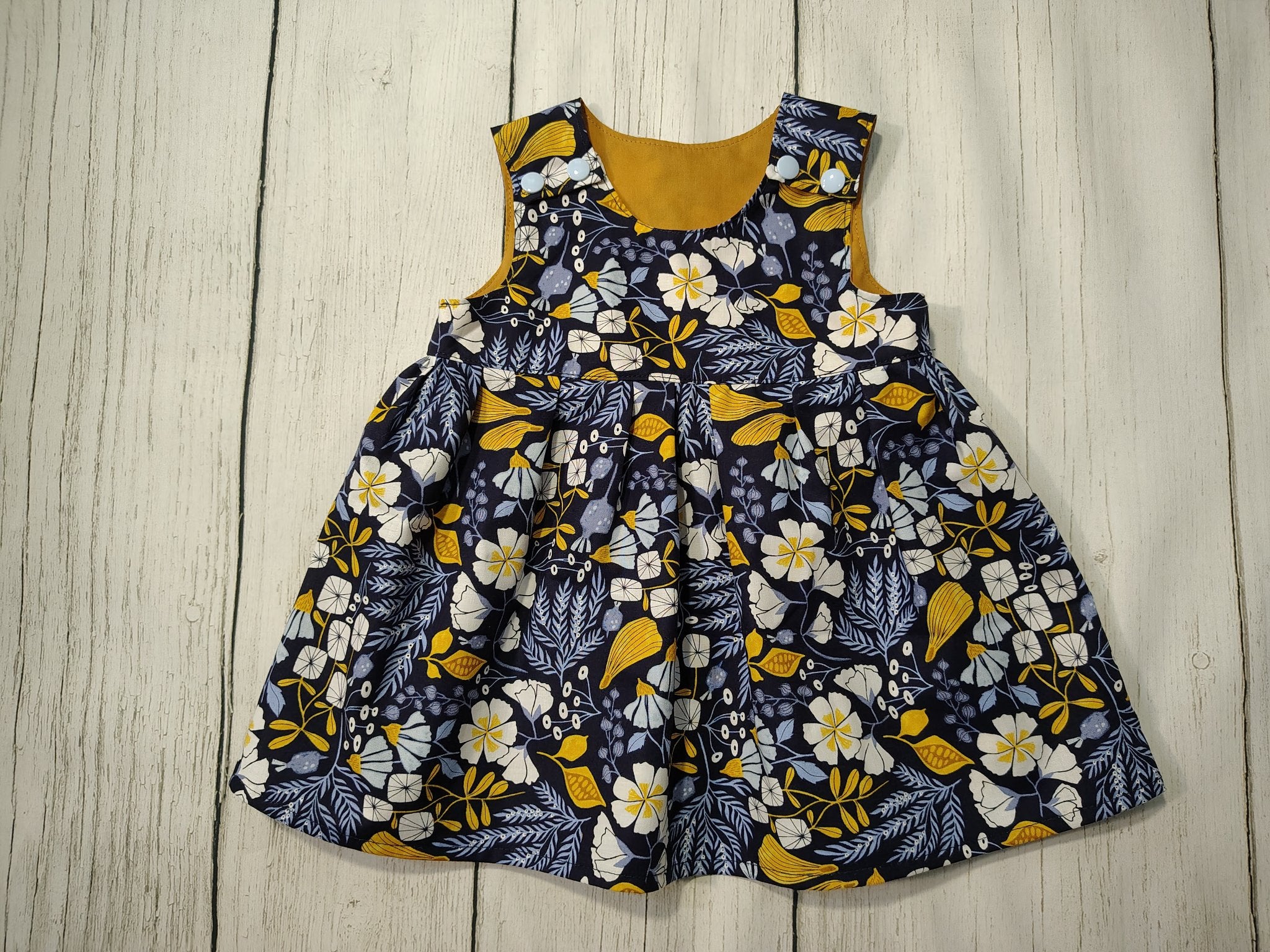 5fef922b396f5759083117ff_-63-gold-floral-on-navy-jumper-09_1760309672103.jpg