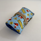 5fef922b396f5759083117ff_construction-zone-car-travel-wallet-rolled-up-and-laying-down_1780346072755.jpg