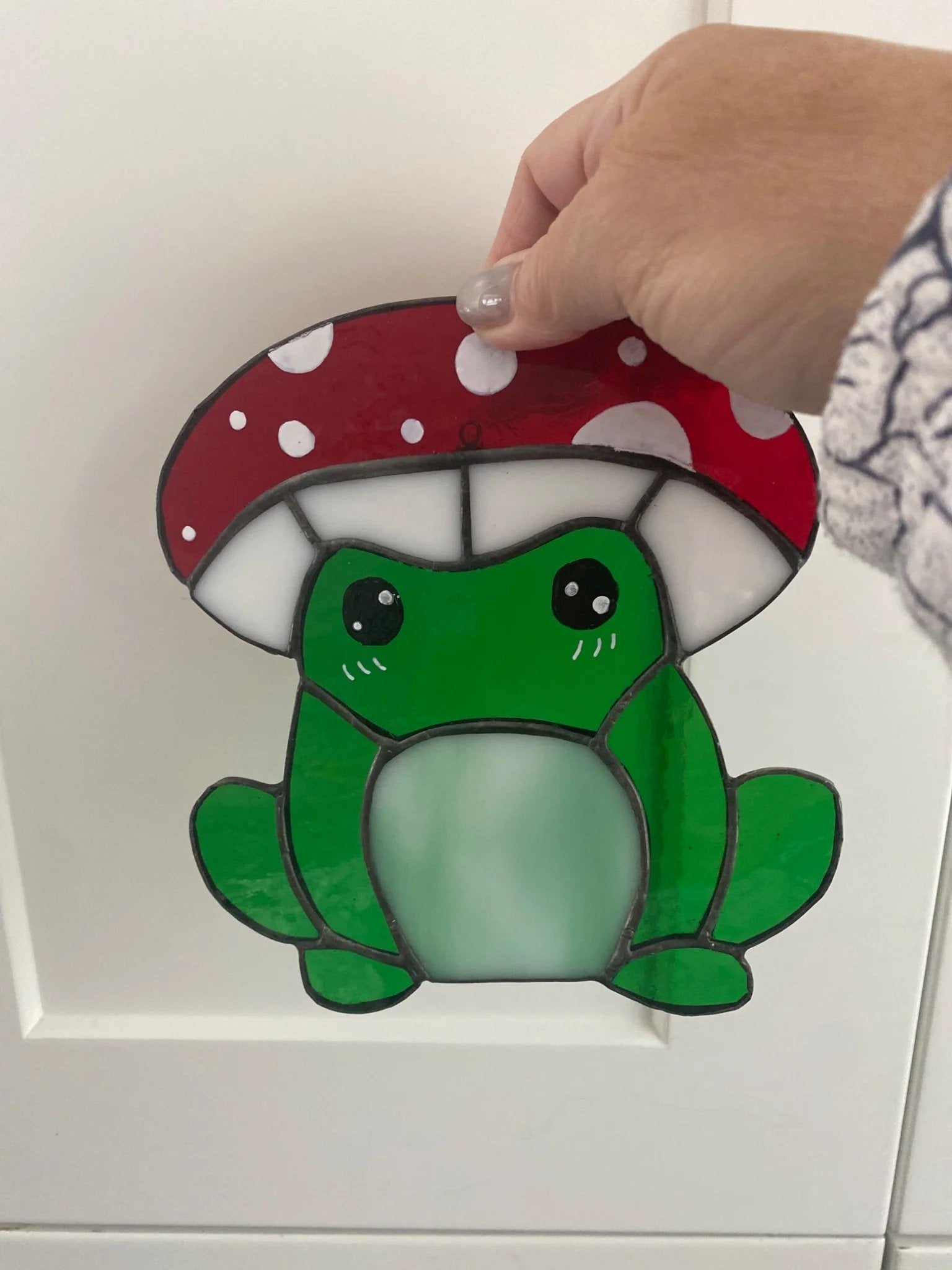 5fef922b396f5759083117ff_frog-with-mush-hat_1775611678462.jpg