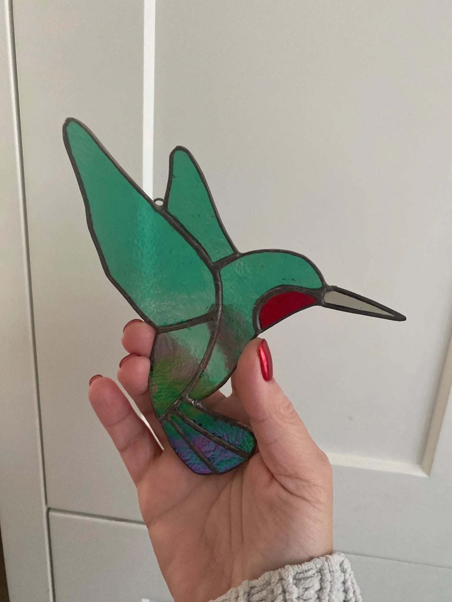 5fef922b396f5759083117ff_humming-bird_1775605209083.jpg