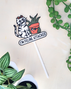 5fef922b396f5759083117ff_im-feline-attacked-plant-tag_1778096492114.png